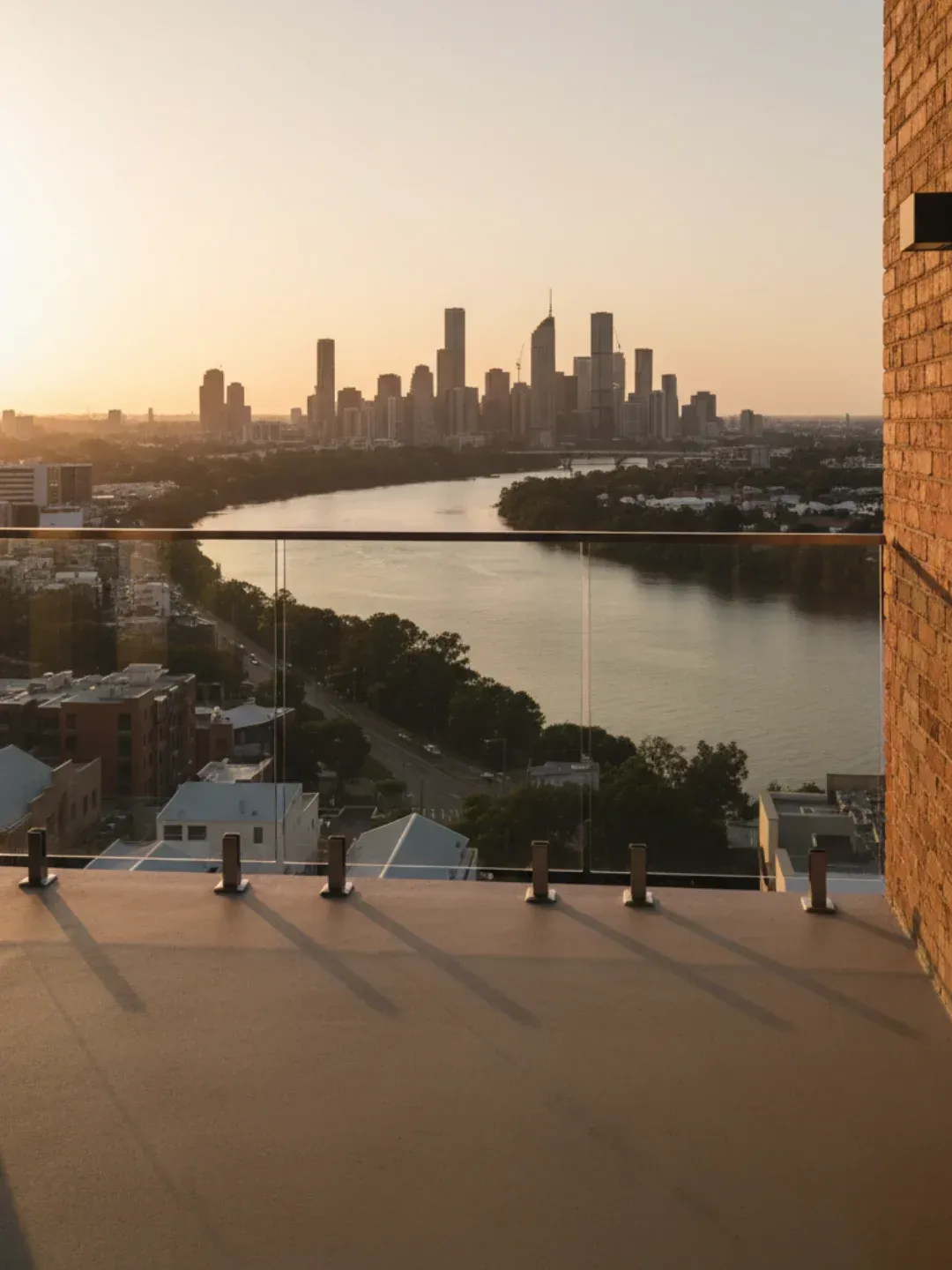 Modern frameless glass balustrades Ascot enhancing river and skyline views with safe compliant installation.